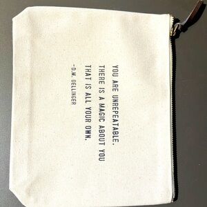 NWOT Canvas zip pouch.
